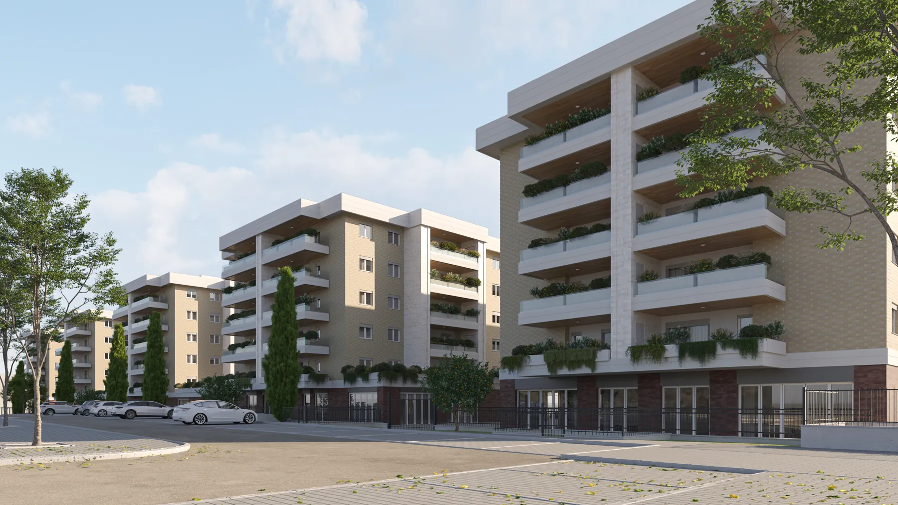 Il fronte di un edificio di Urban District con i balconi verdi, visto dal viale